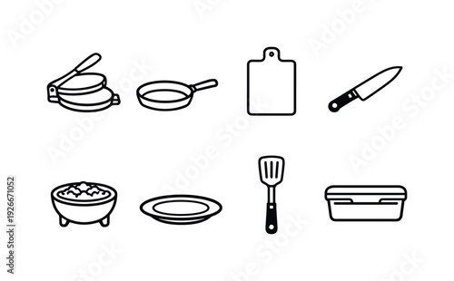 Home taco making items: tortilla press, frying pan, cutting board, kitchen knife, salsa bowl, serving plate, spatula, storage container