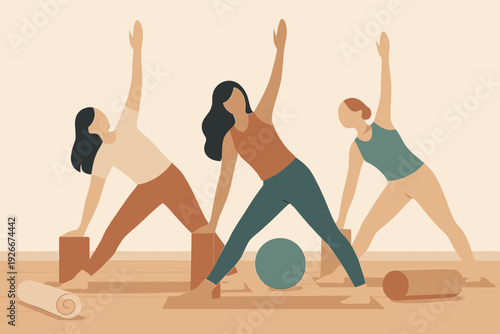 Three women practicing yoga in a studio with props.