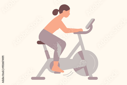Woman Exercising on Stationary Bike for Fitness and Health.