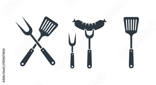 Barbecue tools and sausage depicted in a striking black silhouette