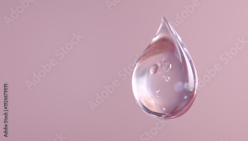 light drop of water on a pink background