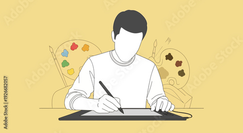 Man creating digital illustration on tablet with stylus in a studio environment from a front viewpoint