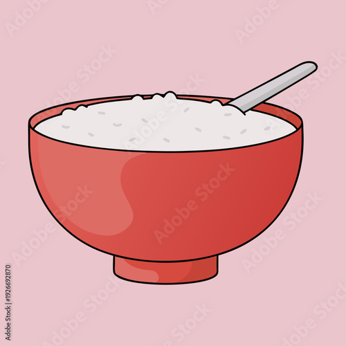 A red bowl filled with white rice and a silver spoon