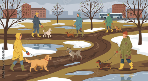 People in raincoats and boots walking dogs on leashes through a muddy city park during an overcast early spring day with melting snow and puddles
