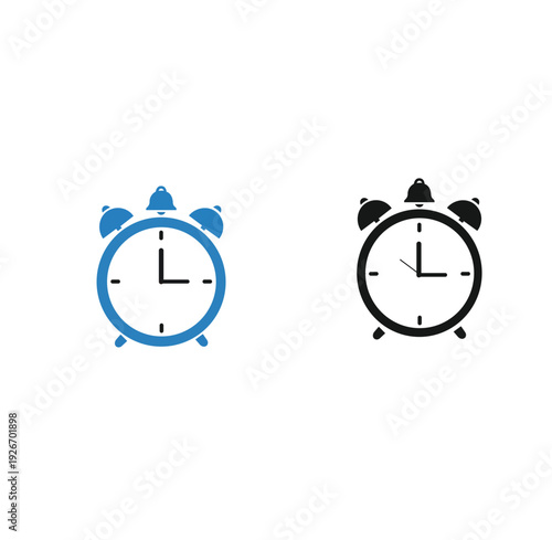 A simple illustration of two alarm clocks in different colors on a white background