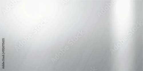 Brushed metal textured silver background with light reflection