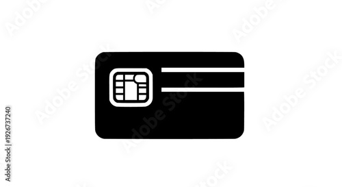 A black credit card with a chip and magnetic stripe on a simple background viewed from directly above