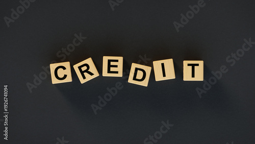 Credit Word Made of Wooden Letter Cubes on Dark Background 3D render