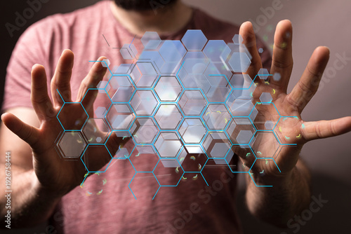 Close up of hands interacting with digital hexagon grid. Representing technology, connection, data, science, innovation,