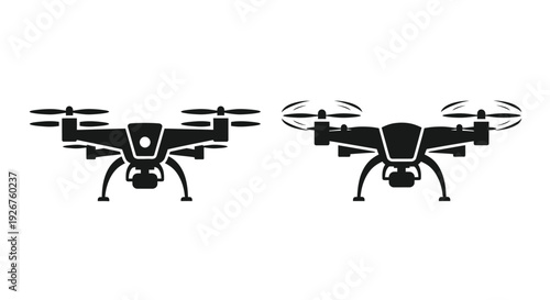 Two black drone icons depicted in a simple flat silhouette