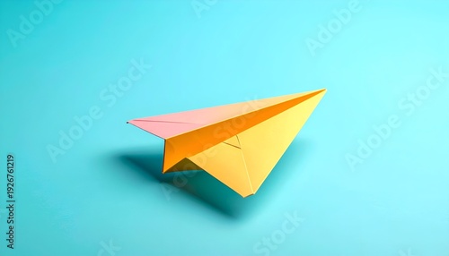Paper airplane on a blue background, symbolizing dreams and aspirations.