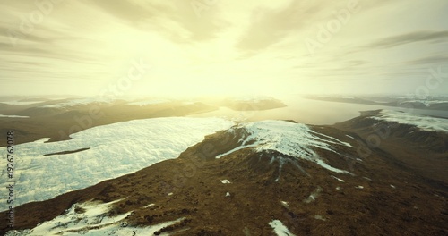 Photos vast ice plain under soft golden light, gentle curvature of snowfield meeting di