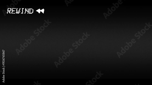 Analog VHS TV Rewind with rewind symbol and timer on a black background. 4K video