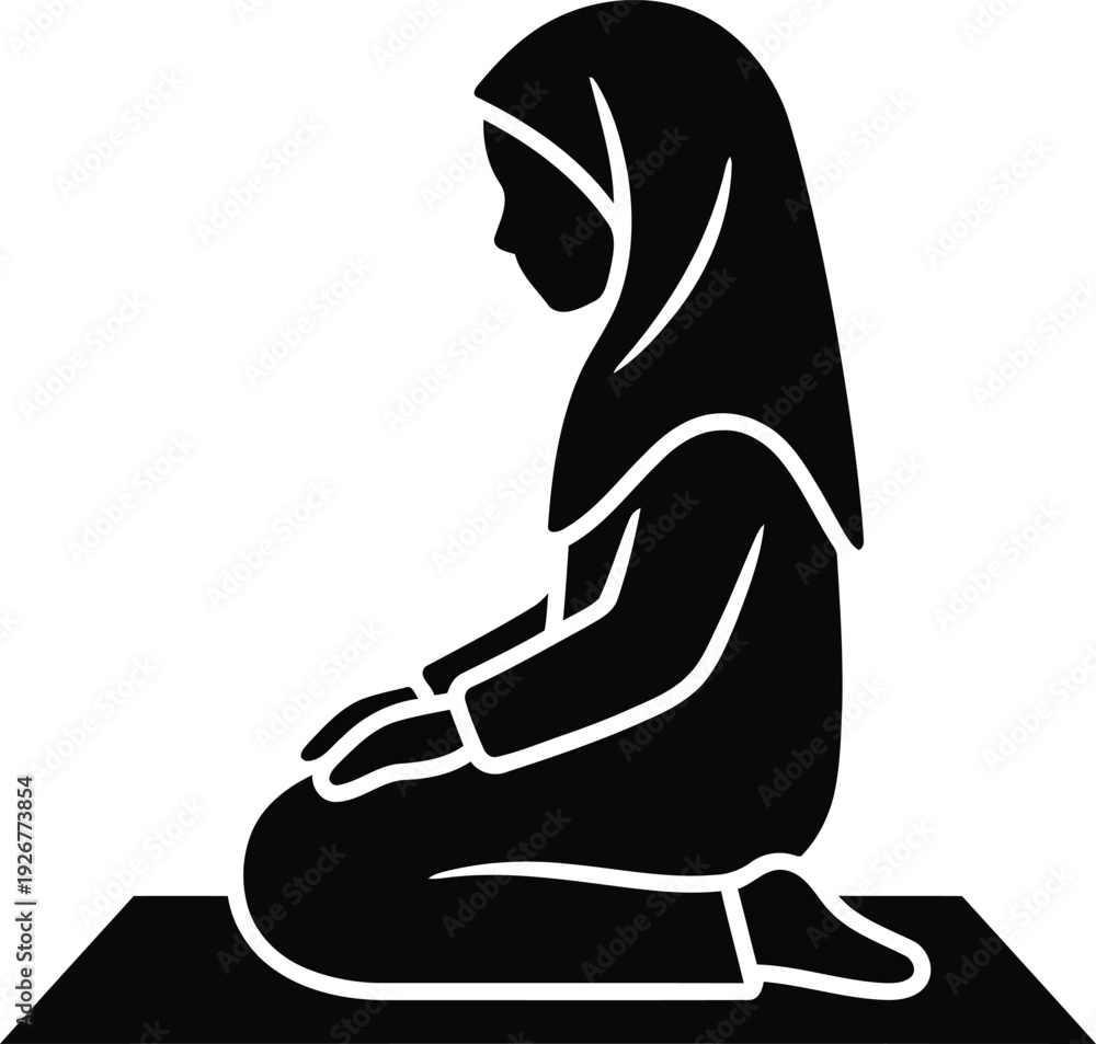 Fototapeta premium Solitude in Prayer: A silhouette of a girl, draped in a modest hijab, deep in solemn prayer, a moment of inner peace and devotion.