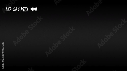 Problematic VHS rewind on a black background. 4K video