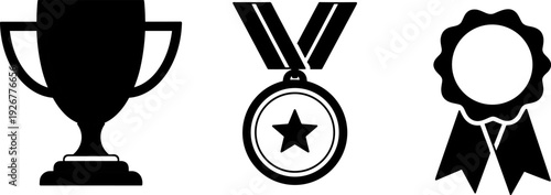 Collection of black silhouette icons representing awards and achievements like a trophy, medal, and ribbon