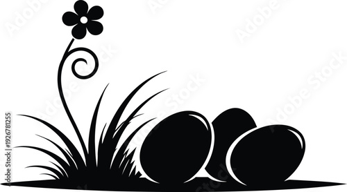 Black silhouette of three eggs and a flower in grass
