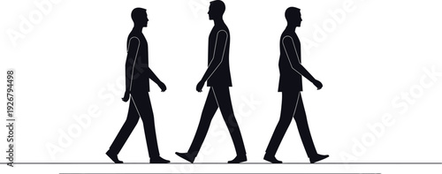 Silhouette of three people walking in a line