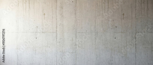 Concrete wall with smooth texture and minimalistic design creating an industrial aesthetic. Concrete wall exemplifies urban architecture for interior design and construction projects.
