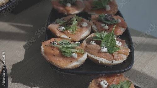 Wallpaper Mural Freshly made salmon appetizers garnished with fresh greens Torontodigital.ca
