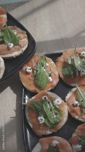 Wallpaper Mural Freshly made salmon appetizers garnished with fresh greens Torontodigital.ca