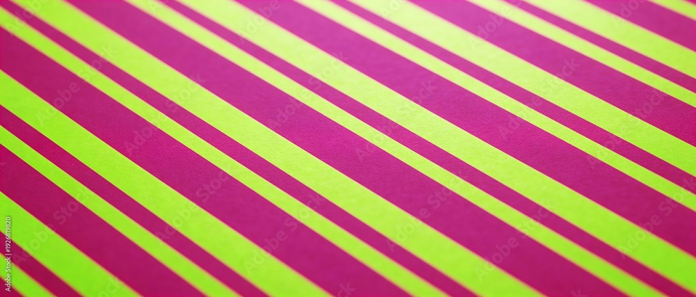 Obraz premium Vibrant diagonal stripes in neon pink and lime green create a bold, energetic pattern