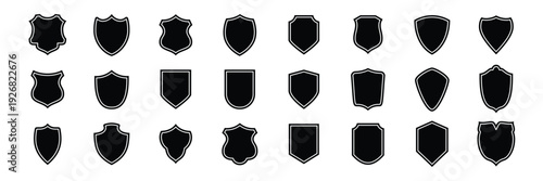 Solid black shield silhouettes in various classic badge shapes, isolated vector collection.