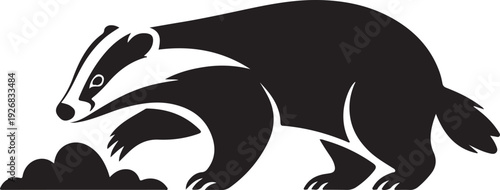 Black and white vector illustration of a badger digging in soil