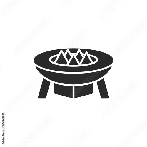 Simple black icon depicting a round fire pit with legs