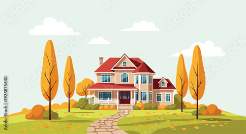 Beautiful large two-story suburban house sits on a green hill surrounded by vibrant autumn trees with orange and yellow leaves.