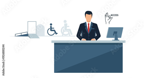 Man in suit standing behind reception desk with computer.
