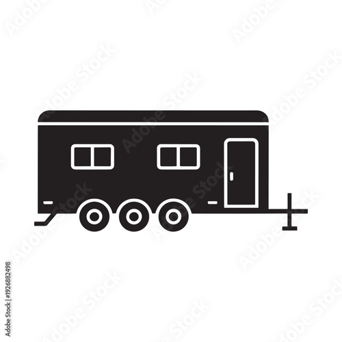 Black silhouette of a camper trailer with three axles and windows
