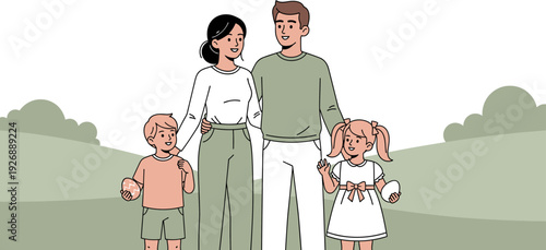 A happy family of four, including parents and two young children, standing together outdoors in a park-like setting with green trees in the background, illustrating unity and togetherness