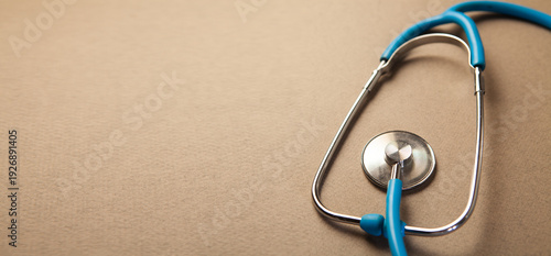 stethoscope on a white table.