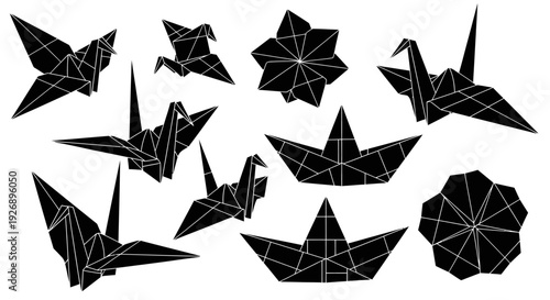 Black origami cranes and flowers on white background paper folding art collection
