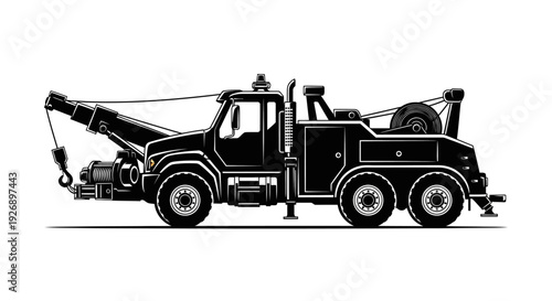 Black and white illustration of a heavy duty tow truck.