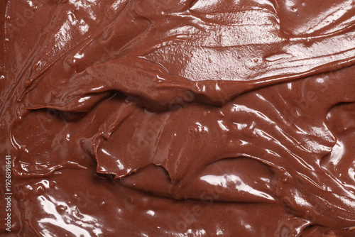 Chocolate nut paste as background, texture, macro