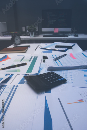 Above table with finance papers, graphs and big data during teamwork meeting with accounting or marketing team discussing budget, strategy or growth development. Closeup of SEO team doing research