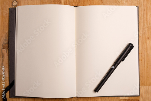 An open notebook with blank...