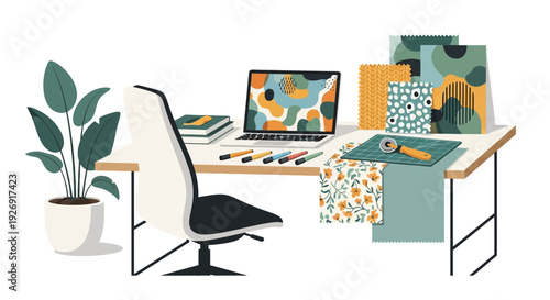 Creative Workspace with Laptop and Art Supplies.