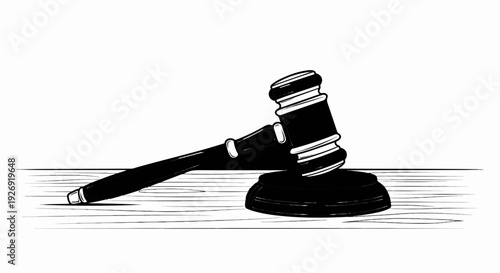 Stylized black gavel rests on a wooden surface with drawn lines