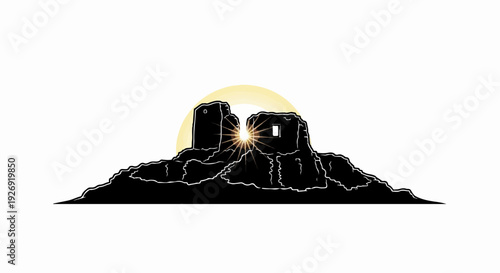 Sunburst behind ancient stone ruins on rocky terrain
