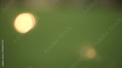 Abstract Green Background with Soft Glowing Light or Bokeh Effect for Creative Design and Visual Arts Projects