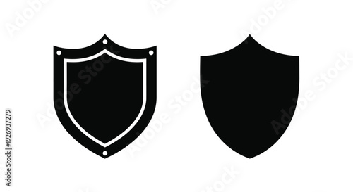 Two black shield icons displayed side by side simple silhouette