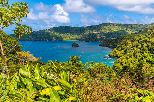 A view looking down into Man O War bay in Tobago on a bright day in January
