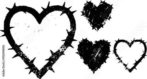 Grungy heart shapes with thorny outlines and distressed textured design elements