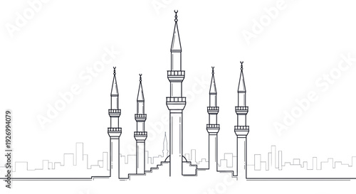 Majestic mosque towers rising above city skyline at sunset
