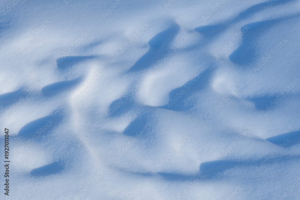Obraz premium Abstract Blue Shadows on Soft Winter Snow Surface