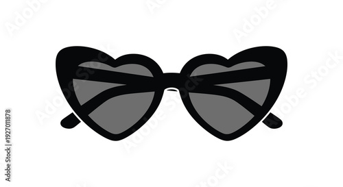 A pair of stylish heart shaped sunglasses presented against a plain white background a striking silhouette high quality professional