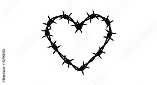 A stark black heart shape is formed entirely from barbed wire creating a poignant silhouette high quality professional